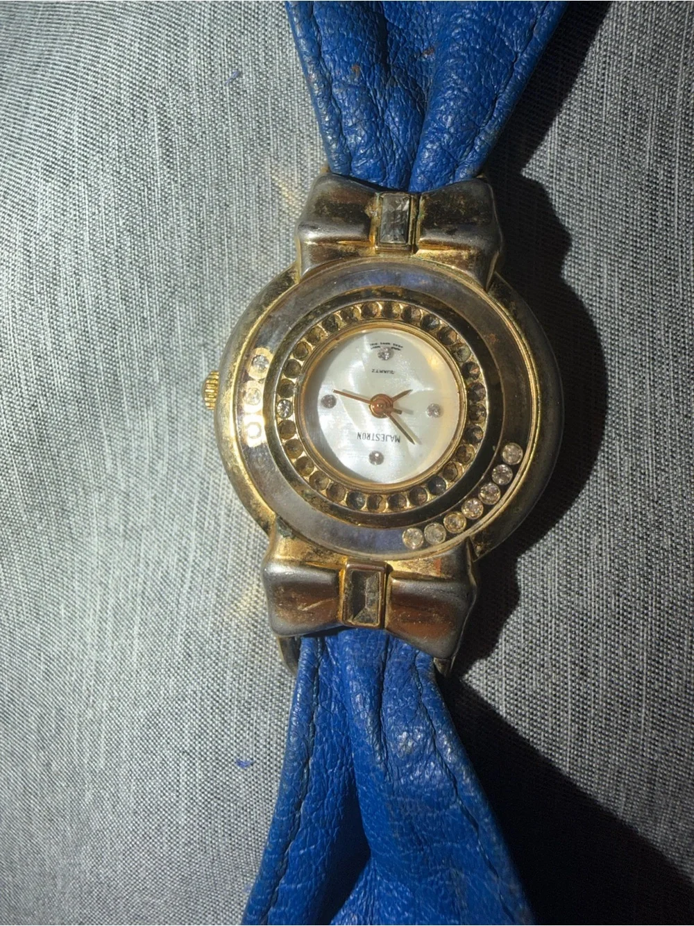 Gold majestron watch with Blue Leather strap - Women Accessories